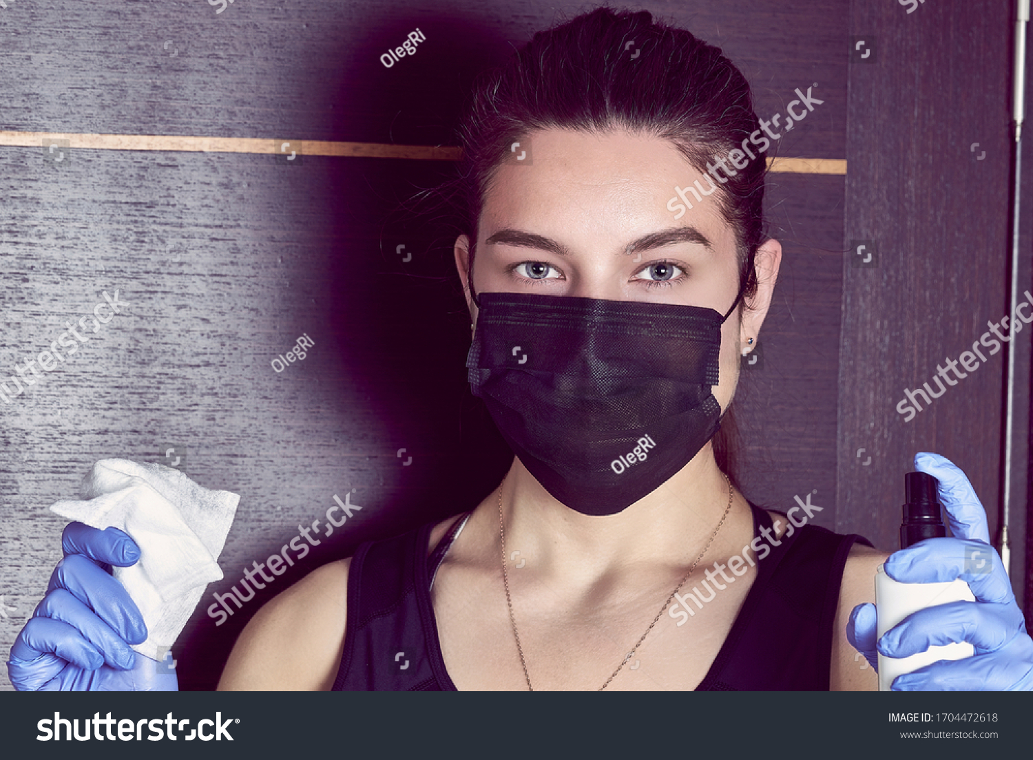 Coronavirus. Woman in quarantine for coronavirus wearing protective mask and plastic gloves. #1704472618