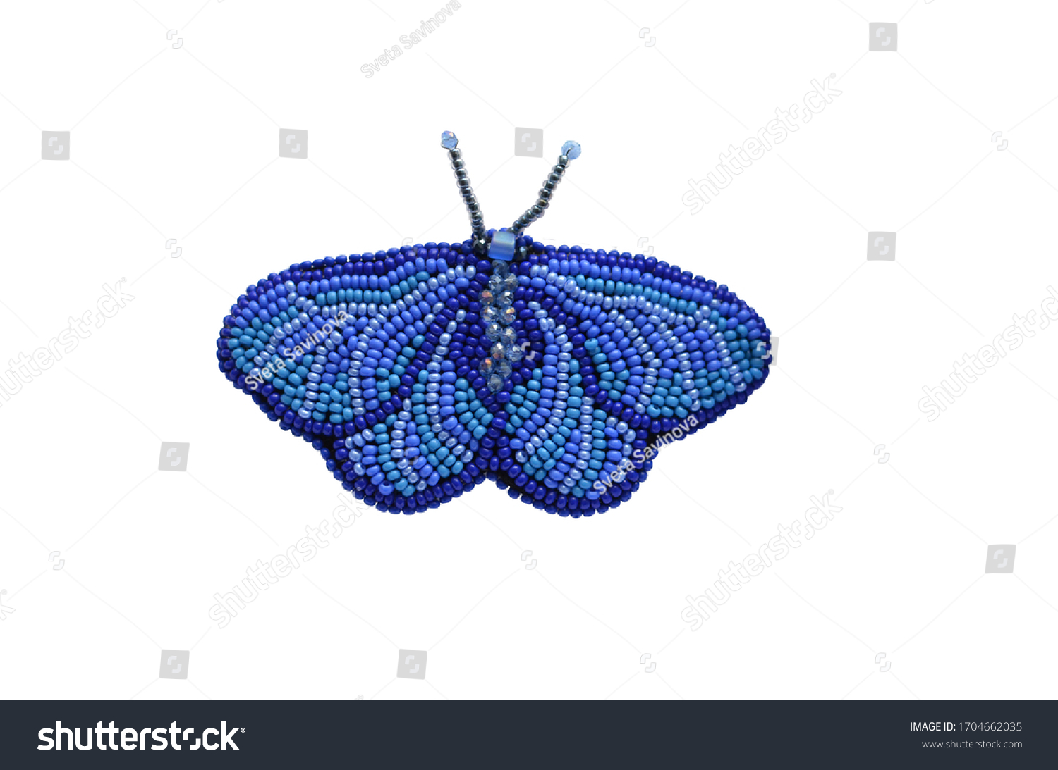 Spring fashion accessory brooch, isolated on white, can be used to print on clothes. Blue moth or butterfly with antennae, shiny beads, fashion item #1704662035