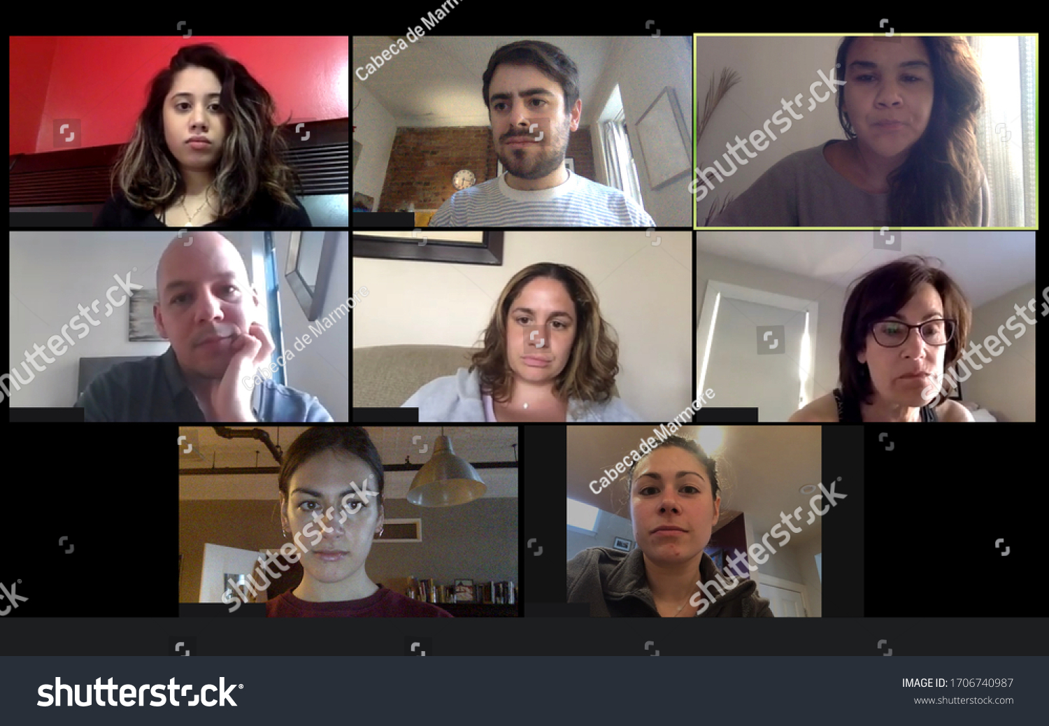 Shot of a screen of teammates doing a virtual conference from their home offices.  Team meeting from home during COVID-19 coronavirus pandemic. #1706740987