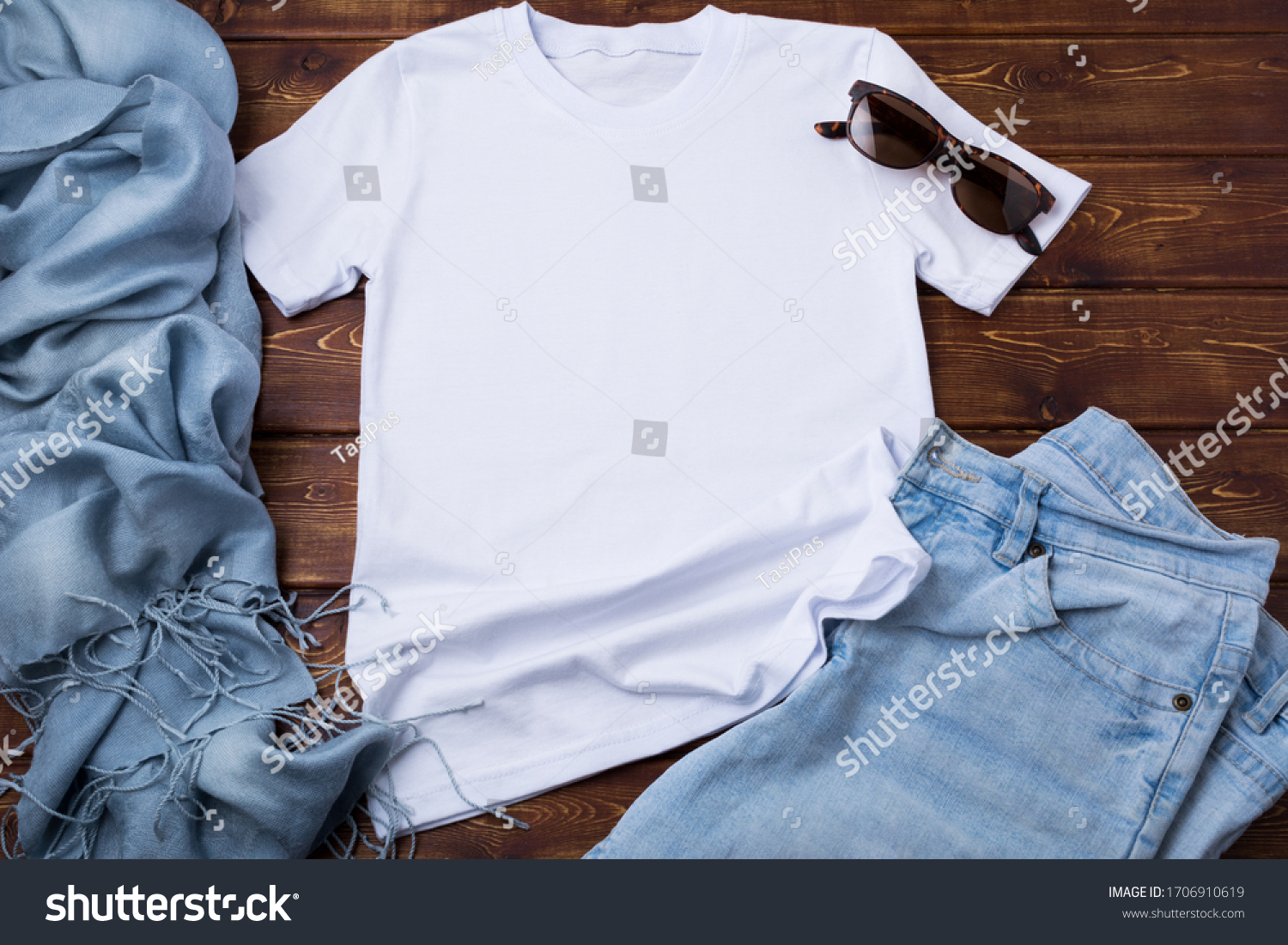 White women’s cotton T-shirt mockup with blue jeans, sunglasses and turquoise scarf. Design t shirt template, tee print presentation mock up #1706910619