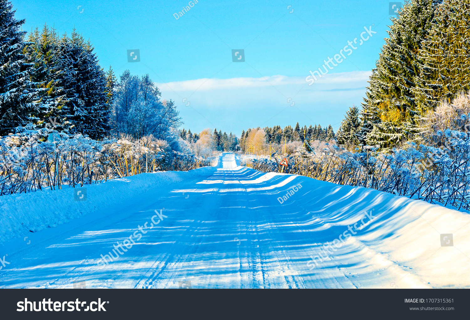 Winter road on snow scene #1707315361