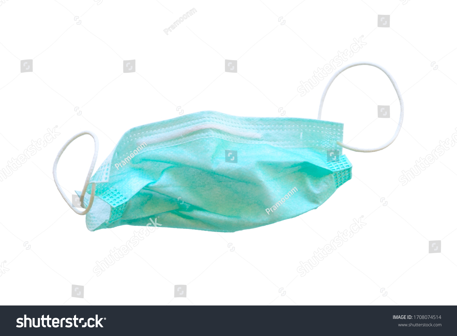 Used green medical surgical mask, Medical protective mask on white background. Disposable surgical face mask cover the mouth and nose. Selective focus. #1708074514