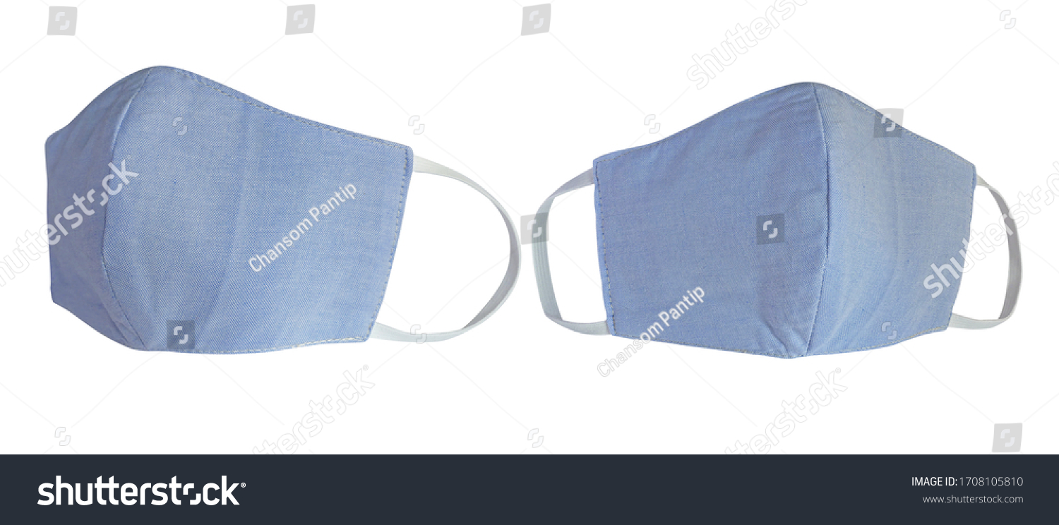 Light blue pastel cotton cloth face masks isolated on white with clipping path. Due to lack of medical protective masks during Coronavirus (COVID-19) pandemic, regular people instead wear cotton masks #1708105810