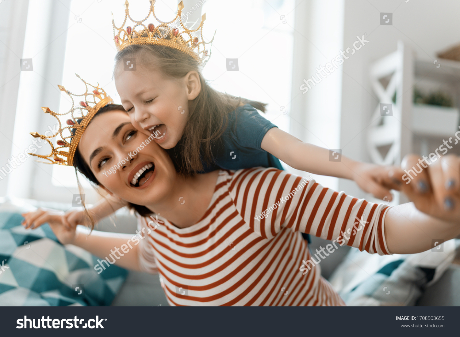 Happy loving family. Mother and her daughter child girl playing and hugging at home. #1708503655