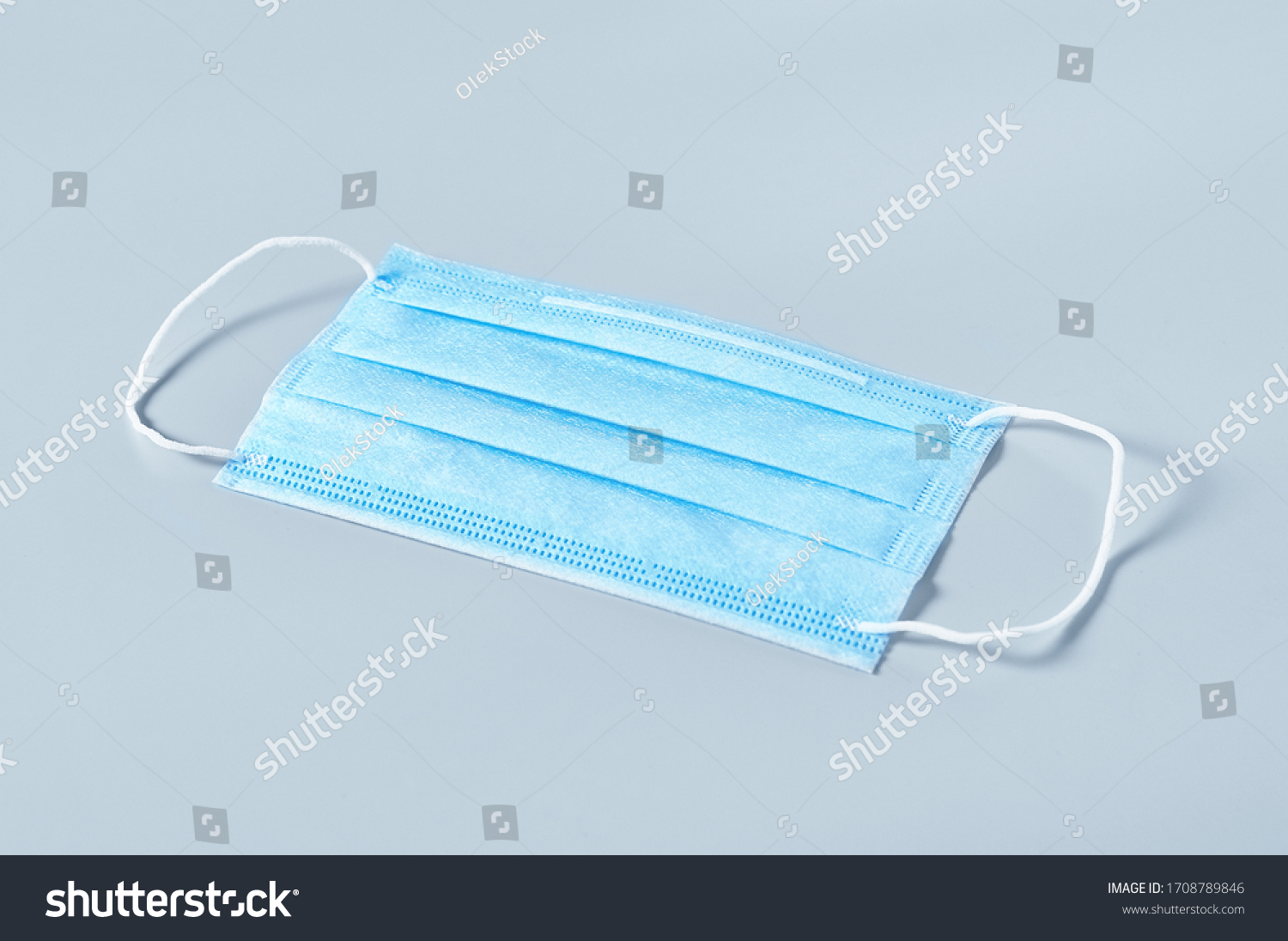Surgical mask for cover mouth and nose on gray background. Concept of protection, virus epidemic or pandemic, corona virus, covid-19 #1708789846