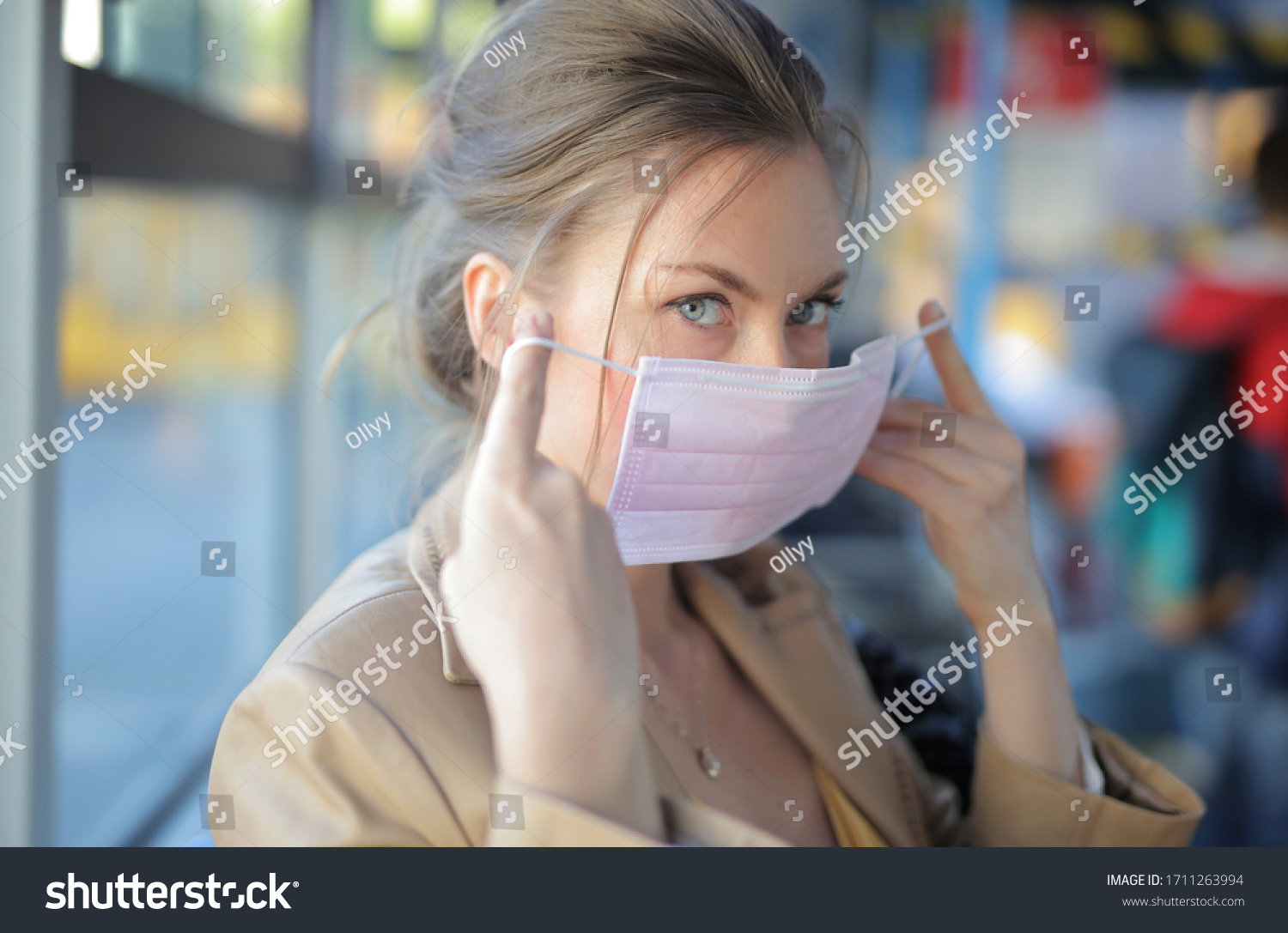 portrait of woman with a mask in a bus #1711263994