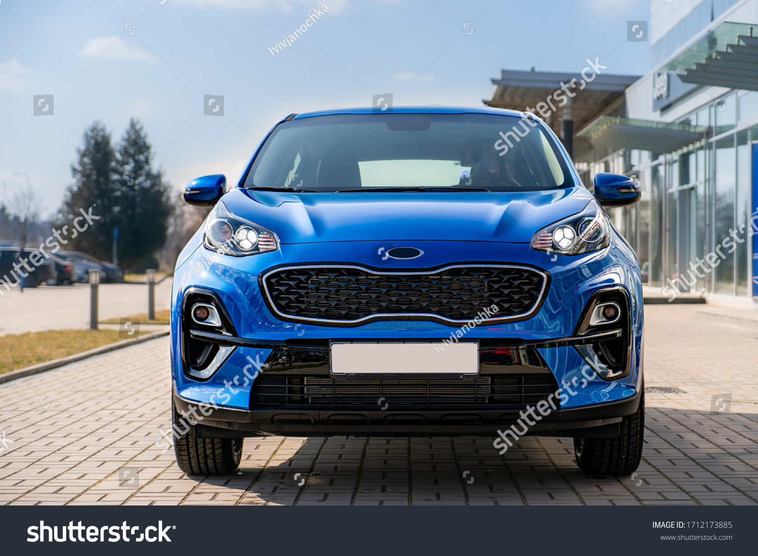 Blue business car with shiny front lights color bright #1712173885
