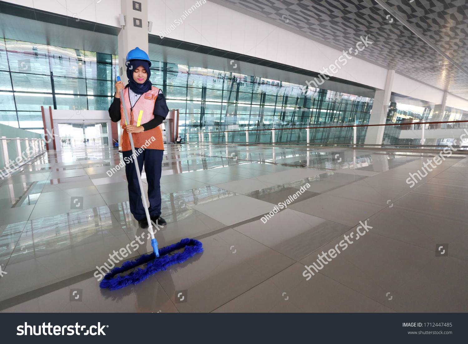Tangerang, West Java / Indonesia : July 2, 2016 : Cleaning services at Terminal 3 Ultimate Soekarno Hatta Airport #1712447485