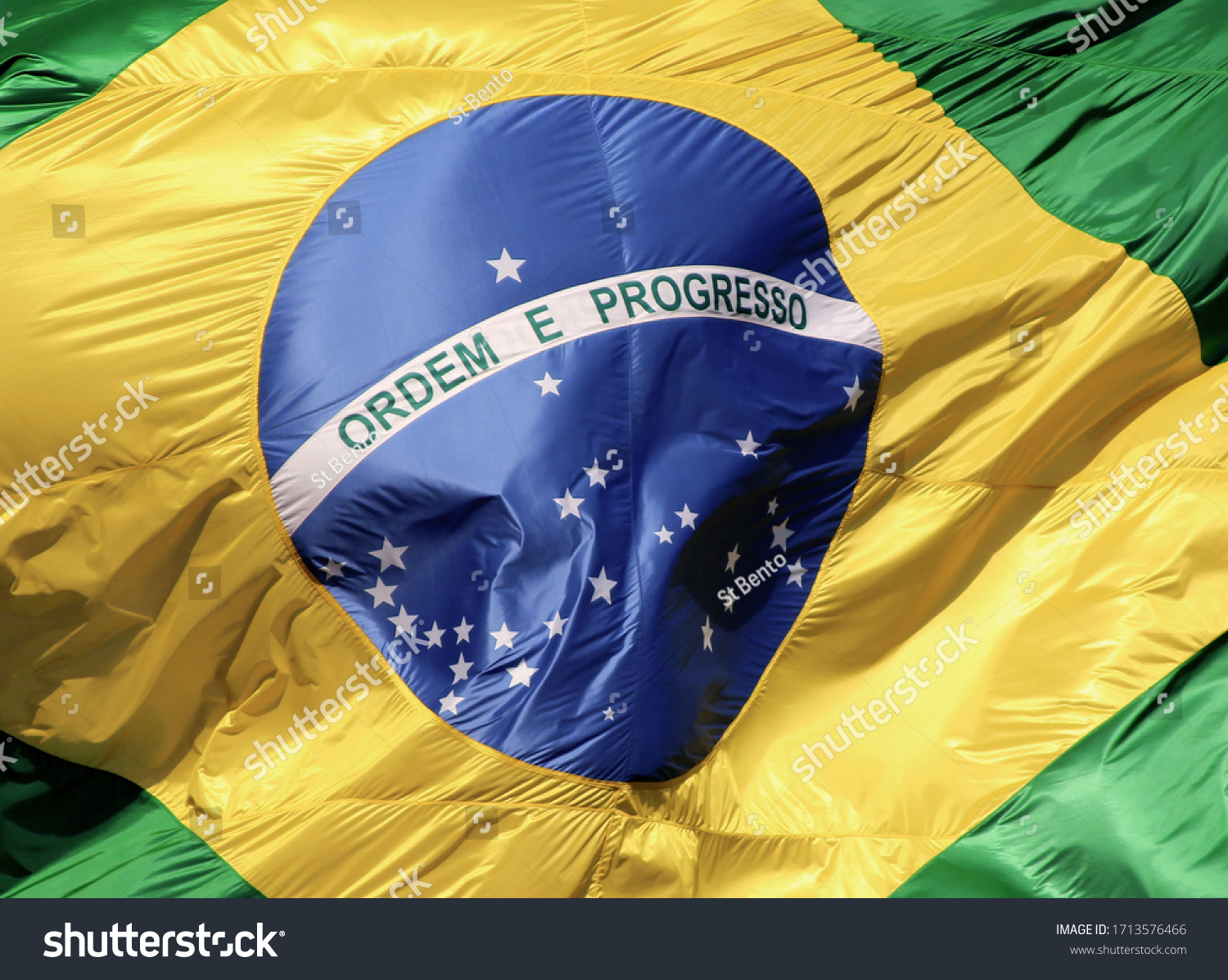 Flag of Brazil moved by the wind in the sky #1713576466