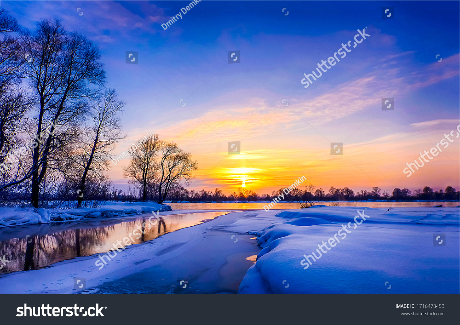 Winter snow river at sunset #1716478453