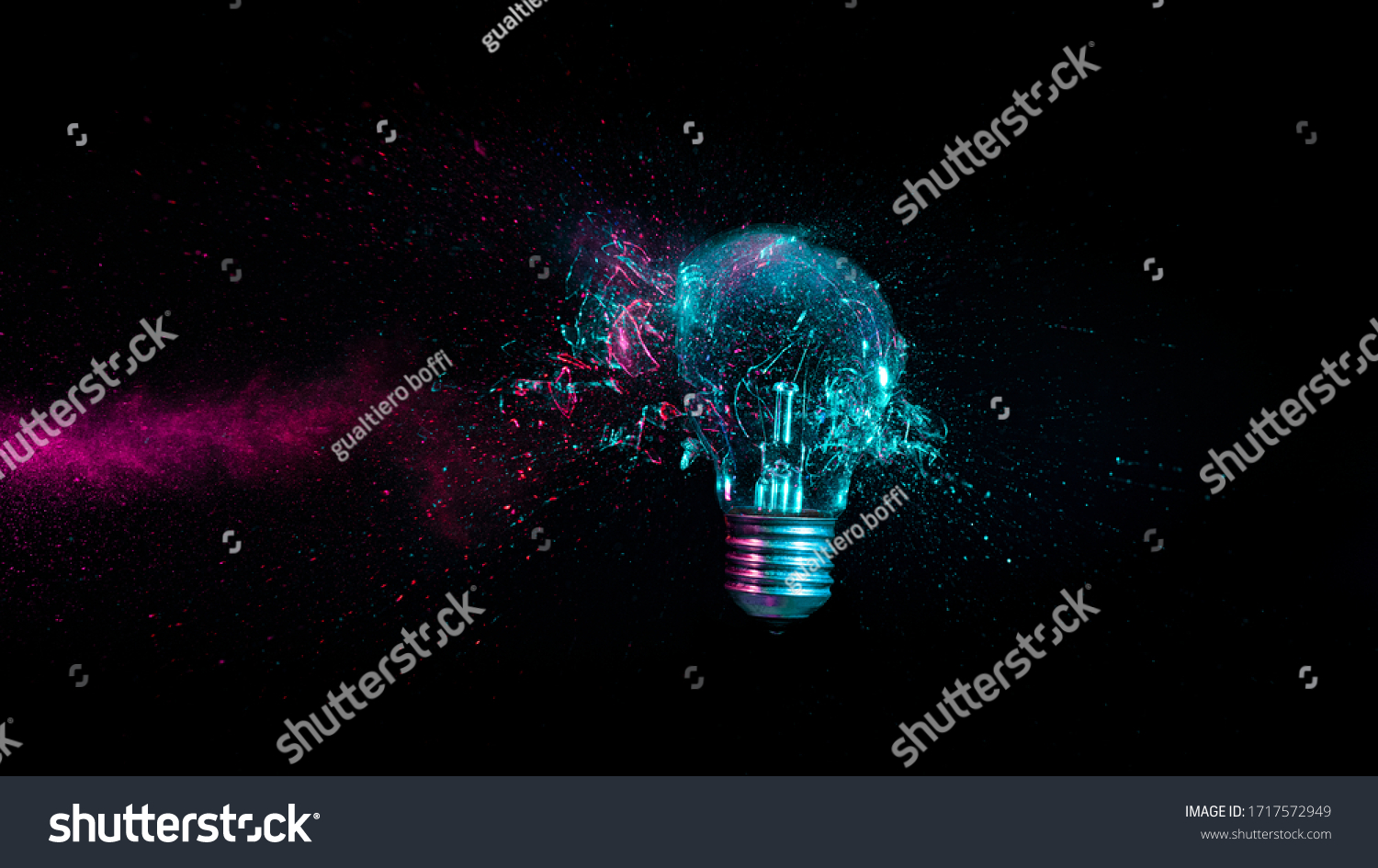 explosion of a traditional electric bulb. shot taken in high speed, at the exact moment of impact. concept of creativity and fragility. #1717572949