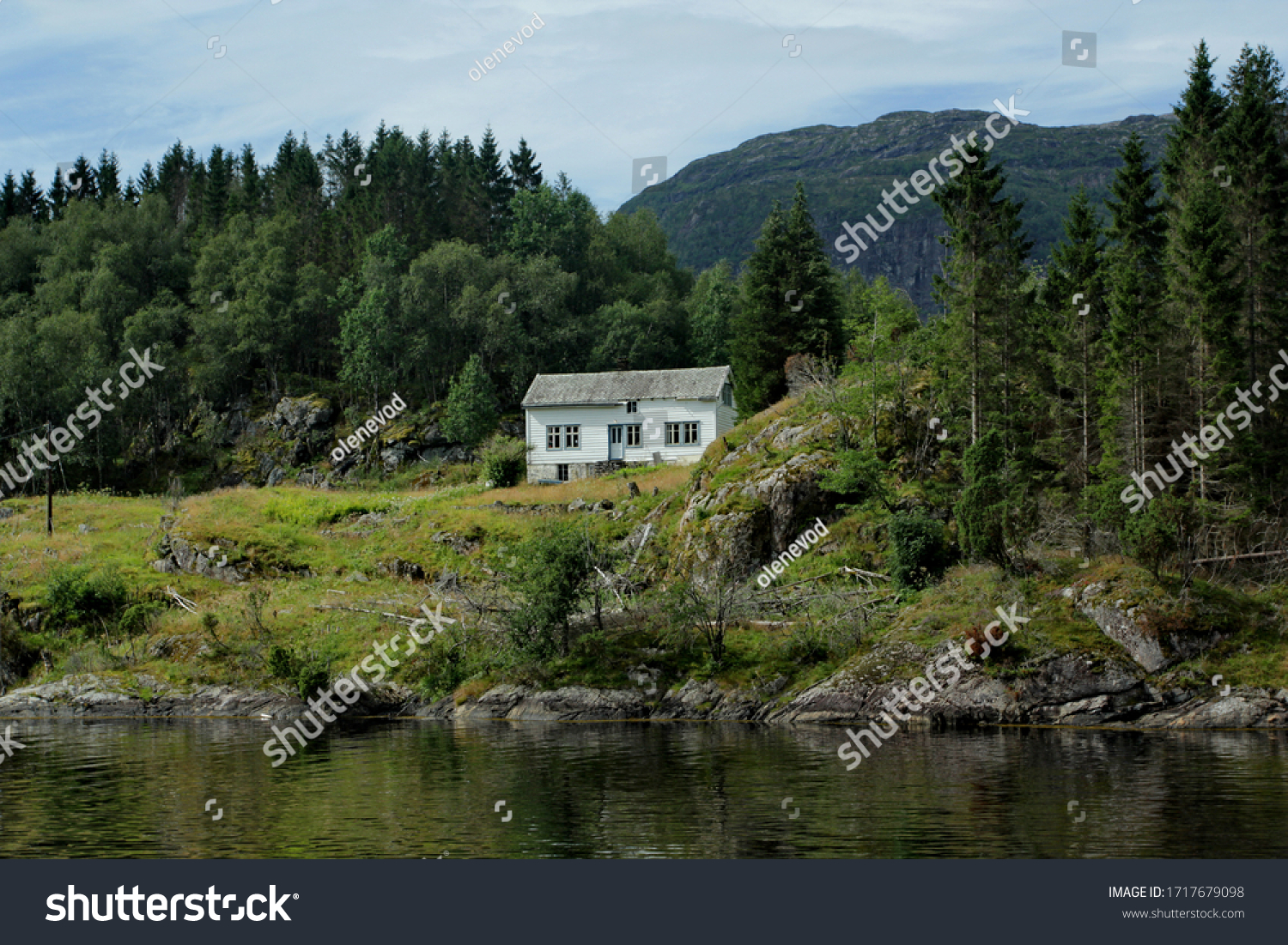 White house on the shore of Eidfjord, Norway #1717679098