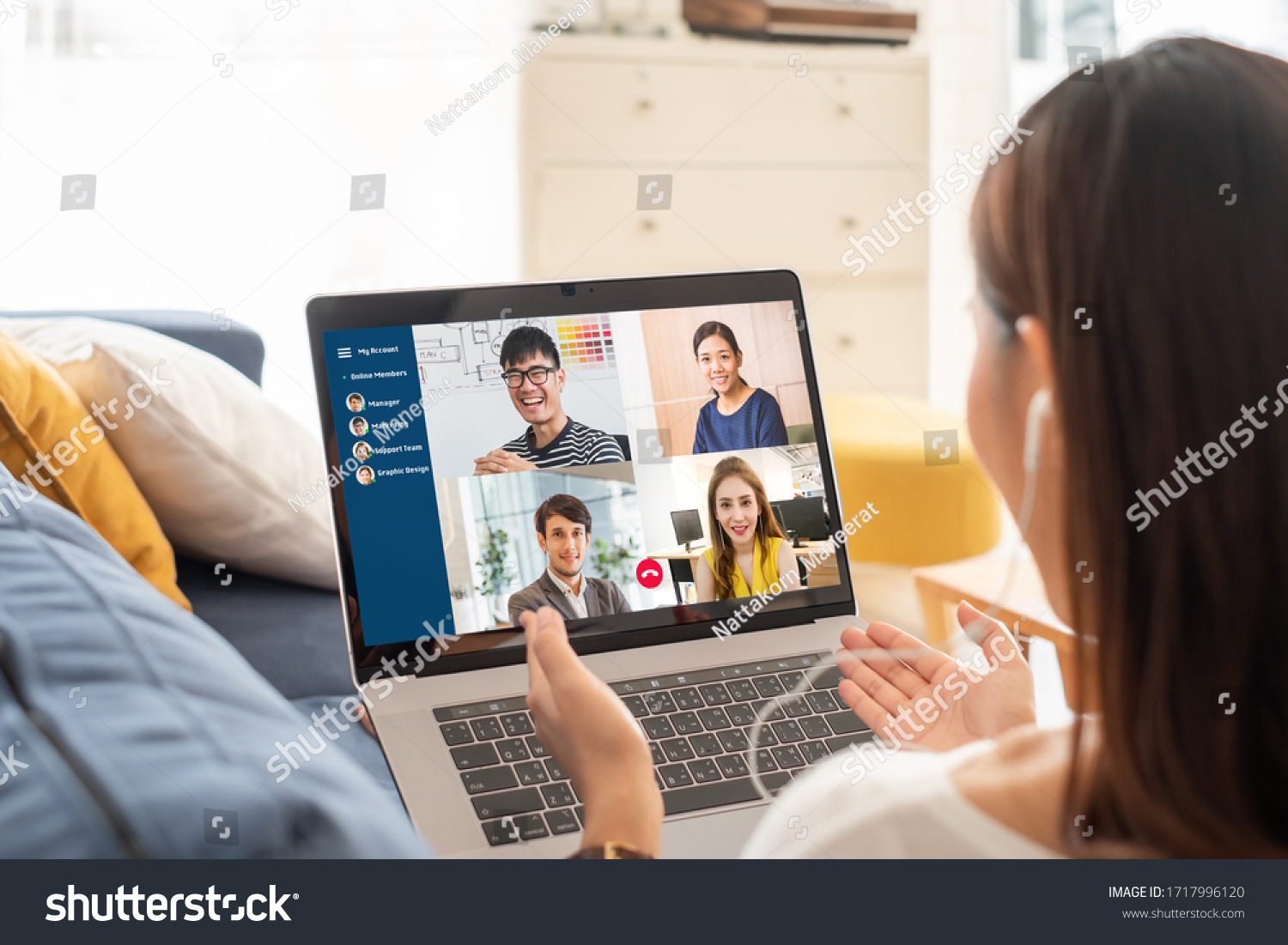Young Asian businesswoman work at home and virtual video conference meeting with colleagues business people, online working, video call due to social distancing #1717996120