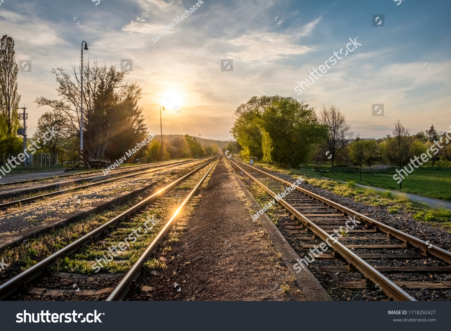 Spring sunset on railway tracks - Czech Republic, Europe #1718292427