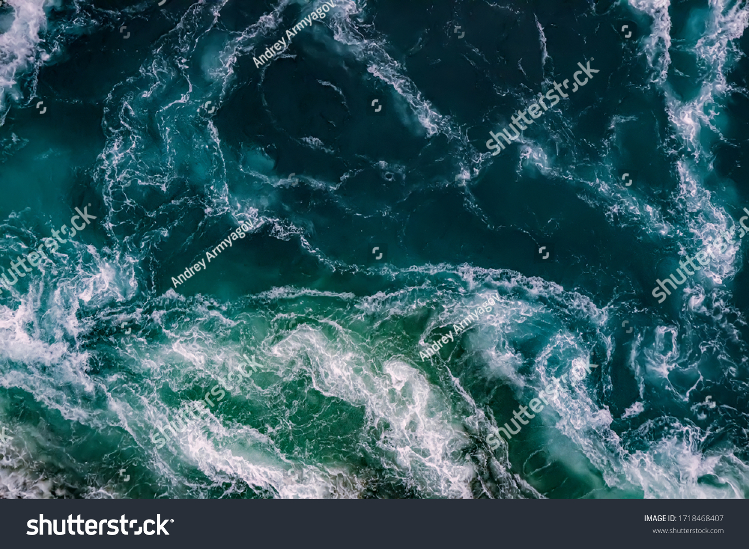 Abstract background. Waves of water of the river and the sea meet each other during high tide and low tide. Whirlpools of the maelstrom of Saltstraumen, Nordland, Norway #1718468407