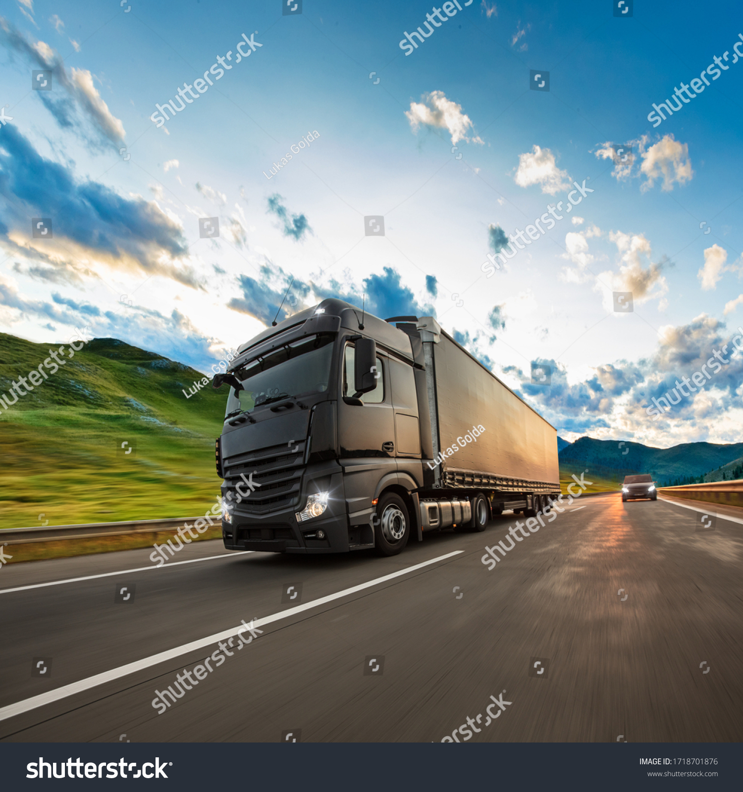 Truck with container on highway, cargo transportation concept. Shaving effect. #1718701876