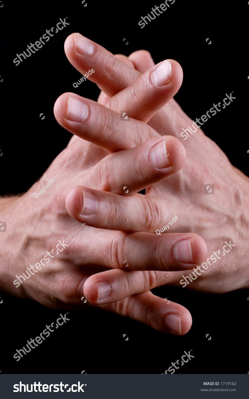 mans hands linked together #1719162