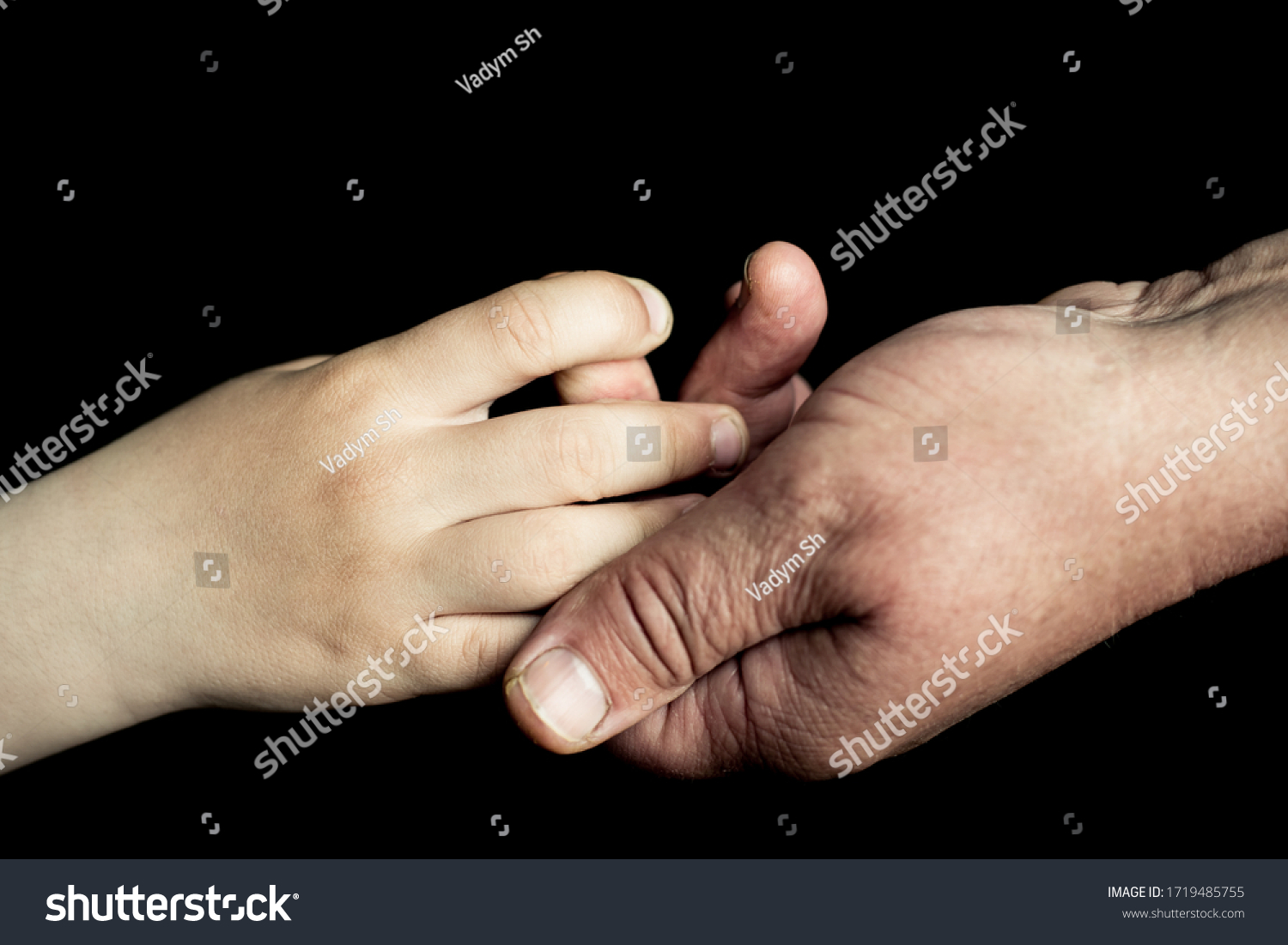 old man's and child hand #1719485755