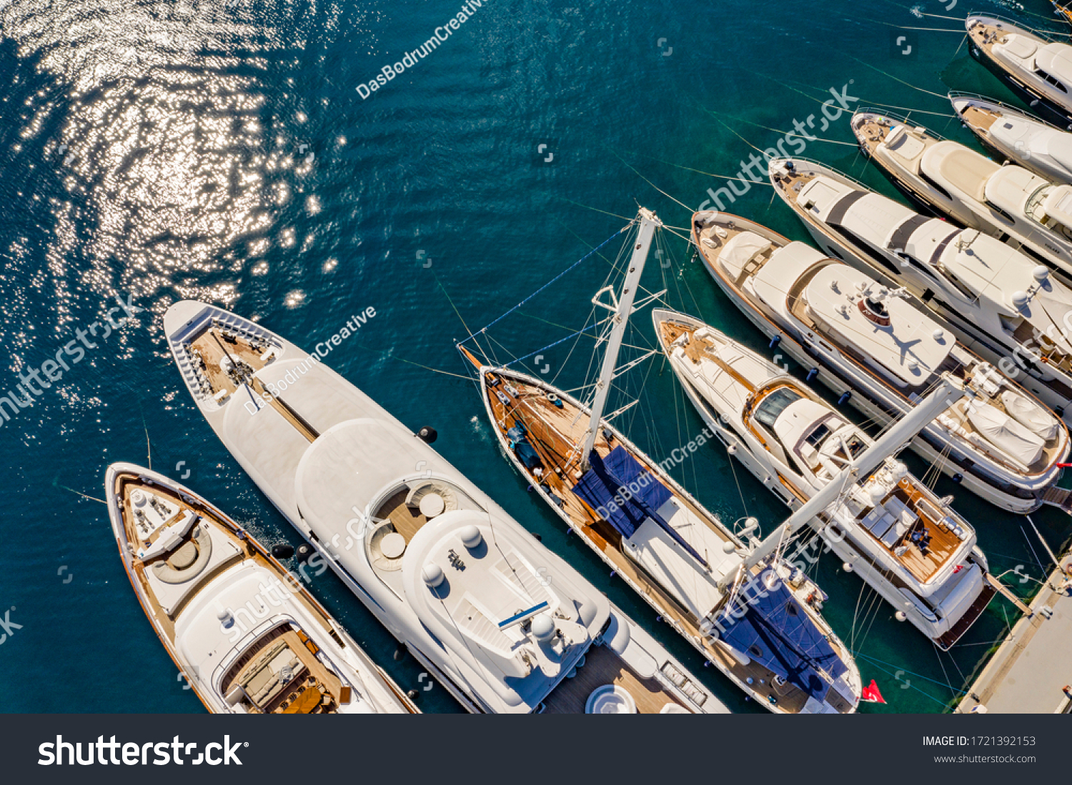 Aerial photo of luxury super yacht marina and sailing boats  #1721392153