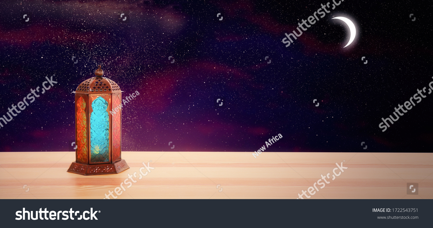 Traditional Ramadan lantern on table, banner design. Muslim holiday #1722543751