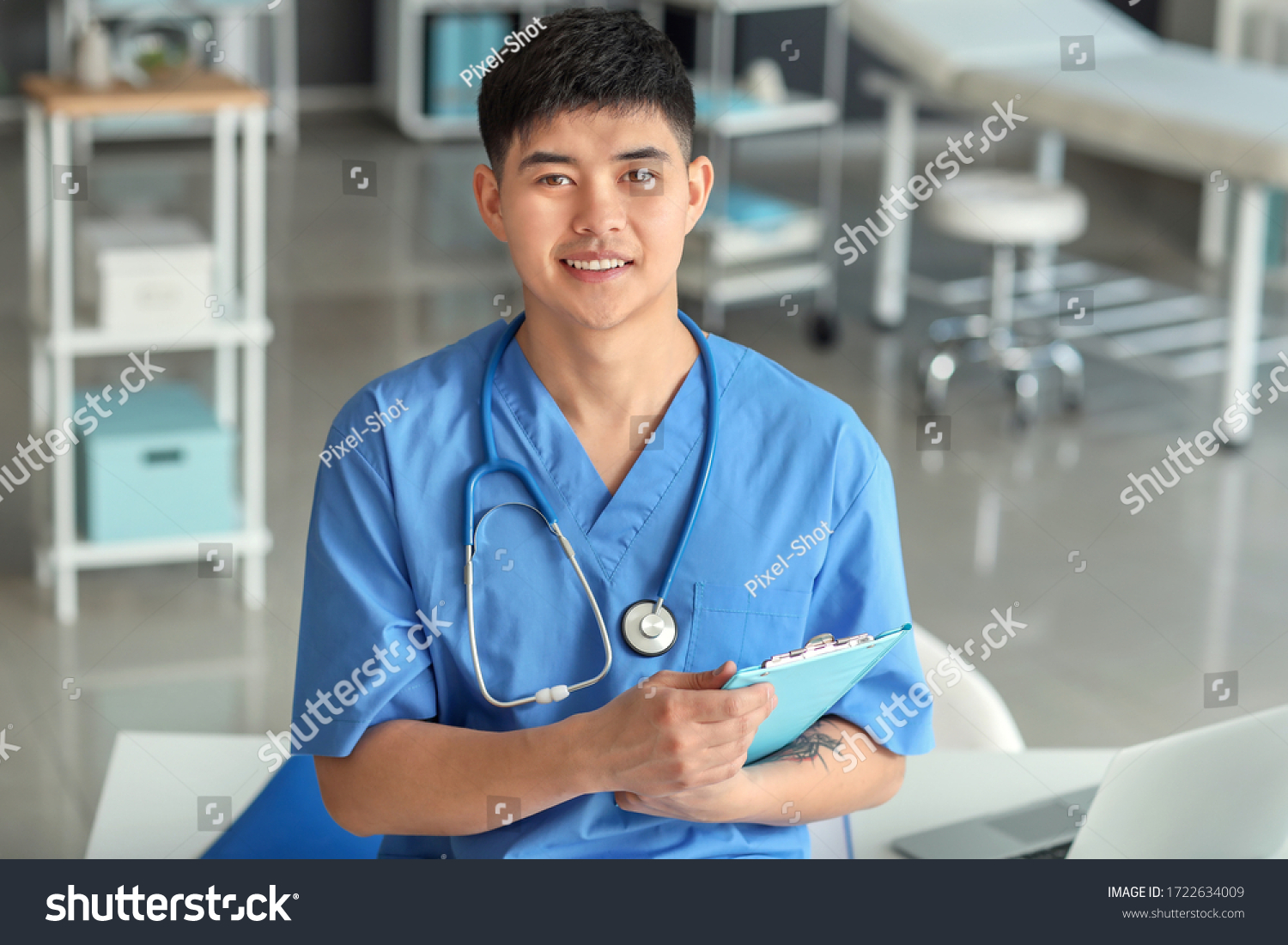 Male Asian doctor in clinic #1722634009