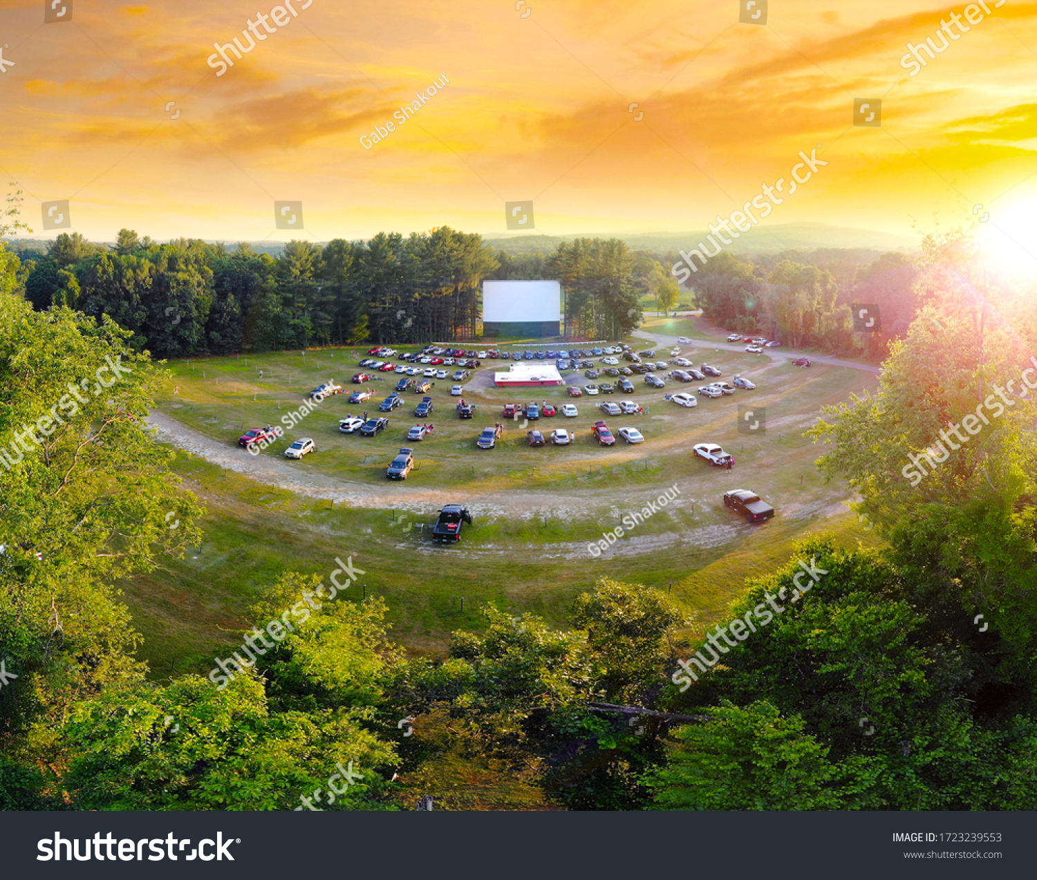 Aerial view of Northfield Drive-In Movie Theater at Sunset #1723239553