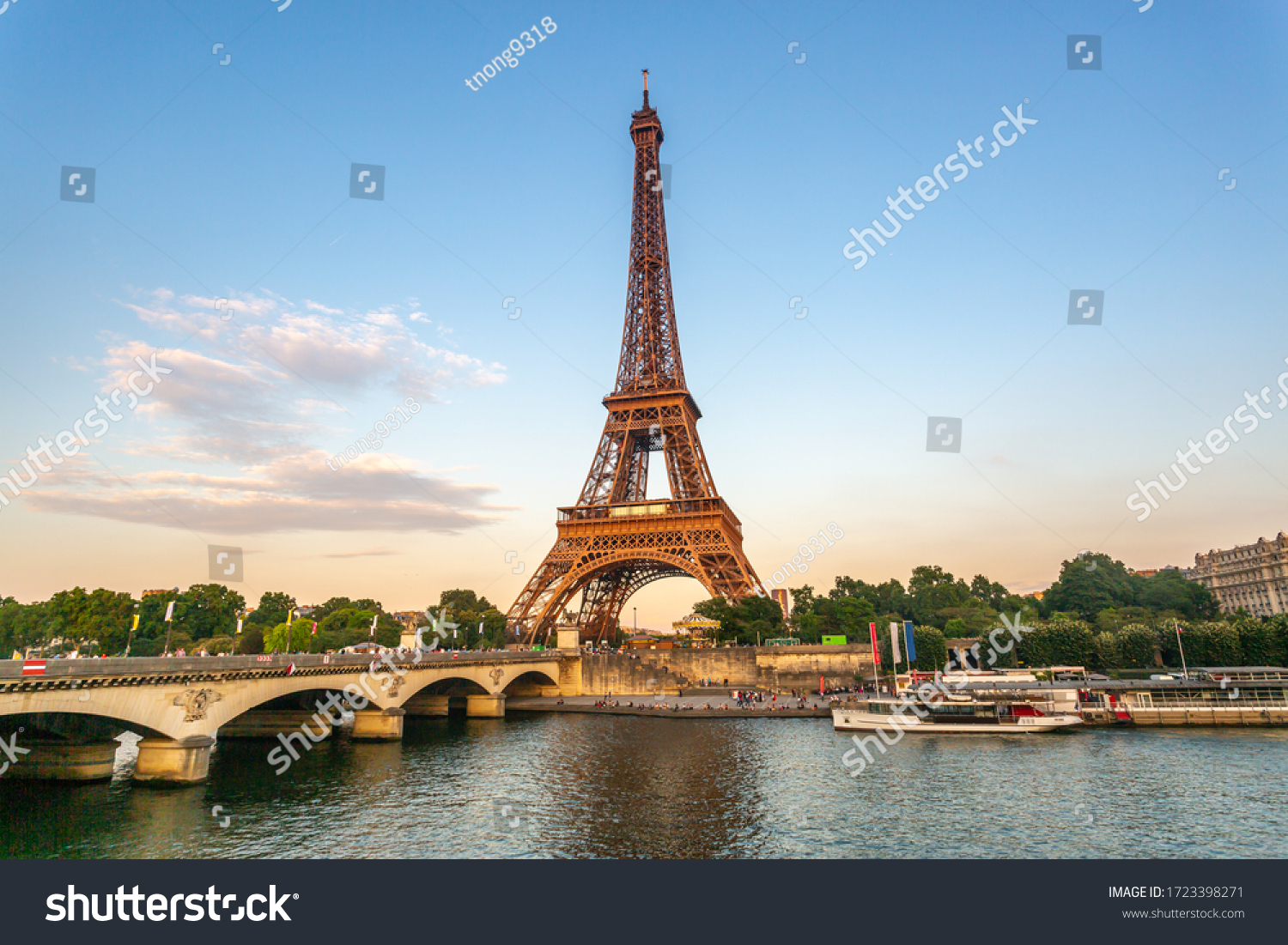 Eiffel Tower at sunset with seine river