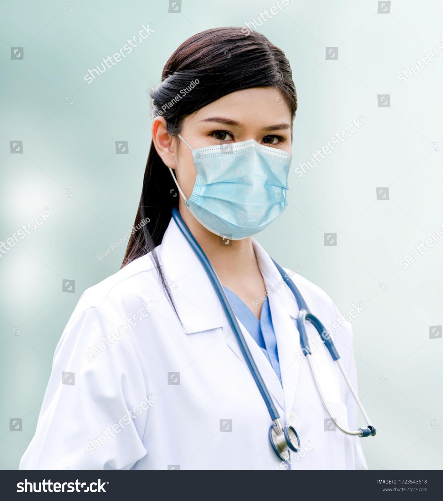 Doctor wear face mask in hospital protect from coronavirus disease or COVID-19. Medical staff are high risk people to receive infection from coronavirus disease or COVID-19. #1723543618