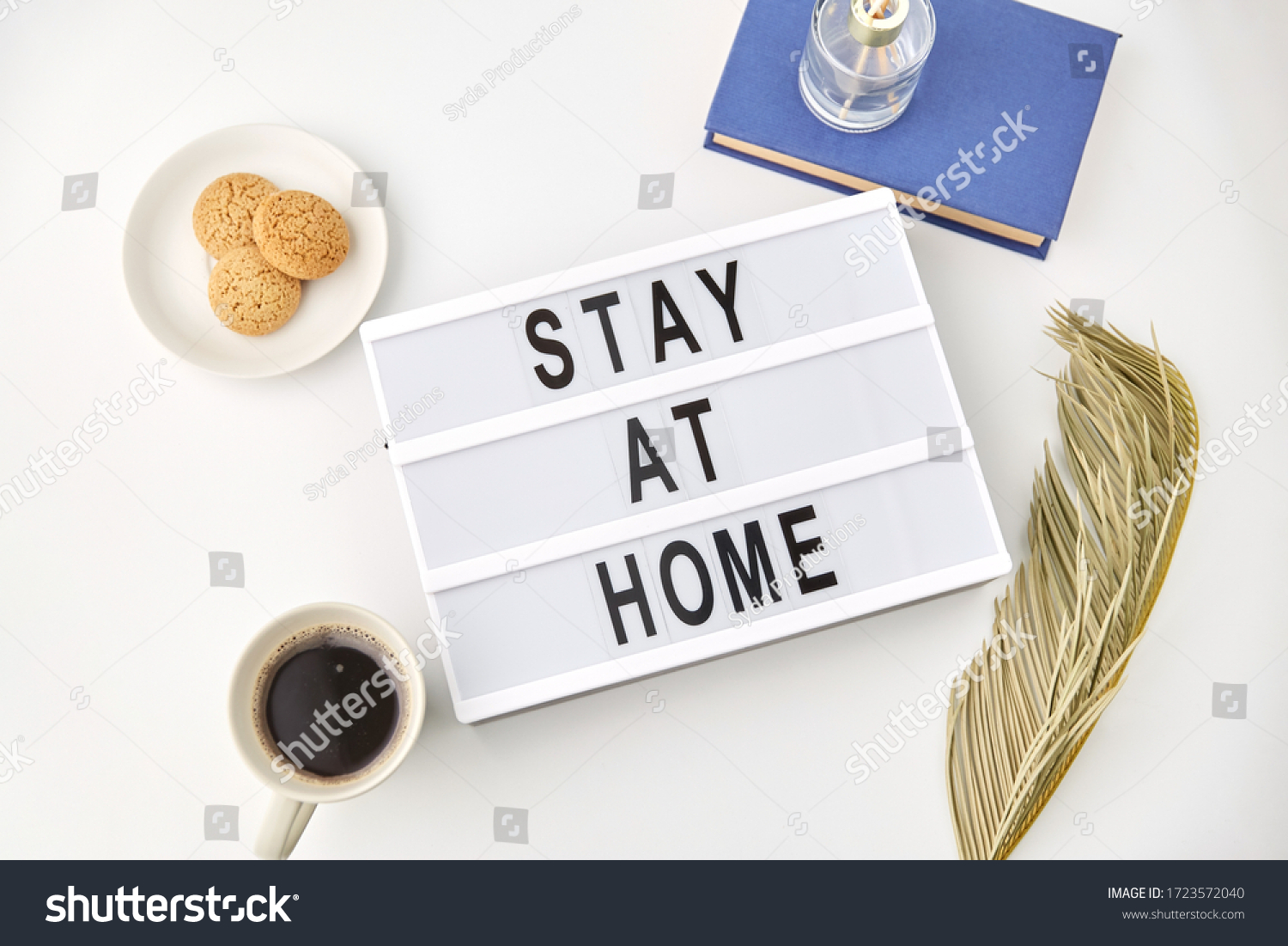 medicine, epidemic and healthcare concept - lightbox with stay at home caution words on white background #1723572040