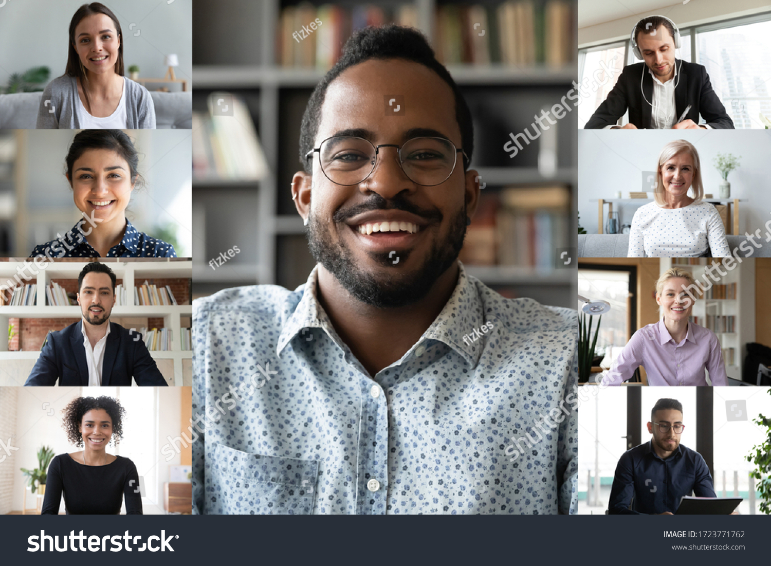 Smiling african American male employee talk speak on video call with multiracial work colleagues, diverse businesspeople coworkers have online webcam conference on computer, engaged in web briefing #1723771762