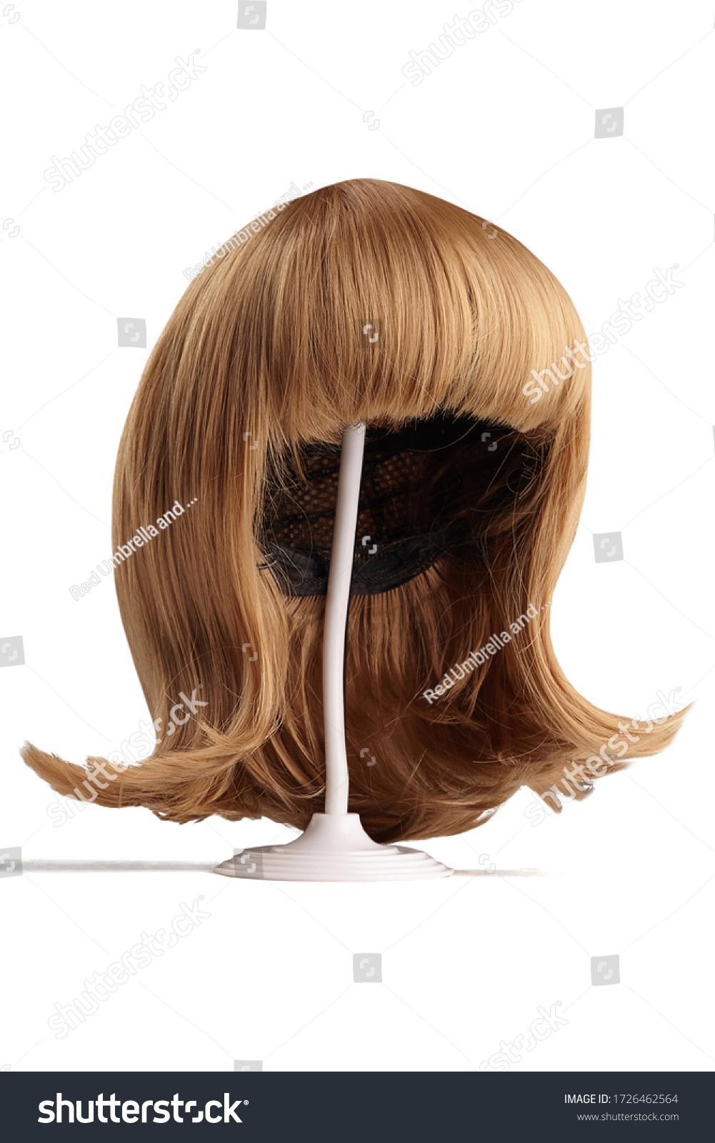 Subject shot of a natural looking blonde wig with bangs and twisted strands fixed on the white wigs holder. The stand with the wig is isolated on a white background.   #1726462564