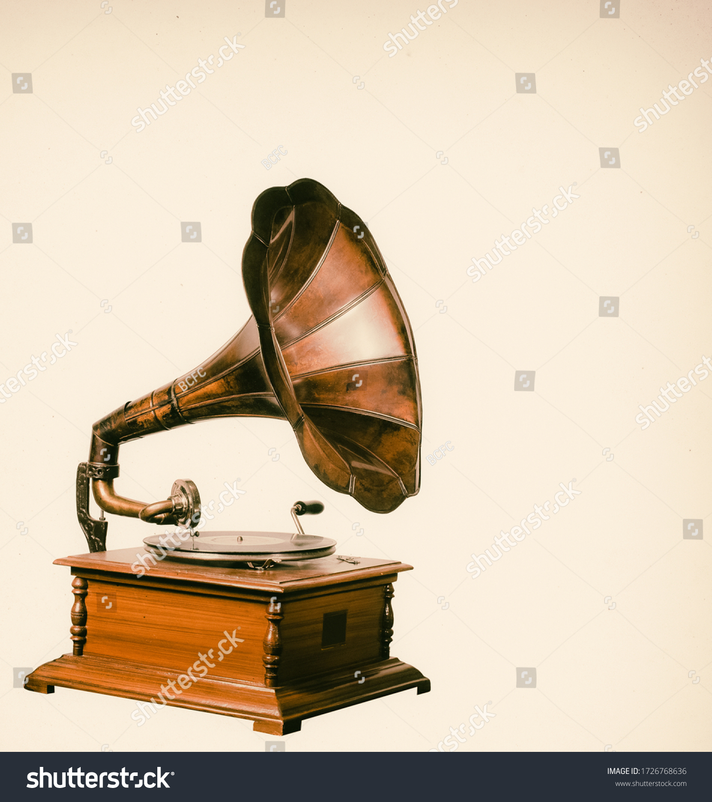 Vintage gramophone player with vinyl record.  #1726768636