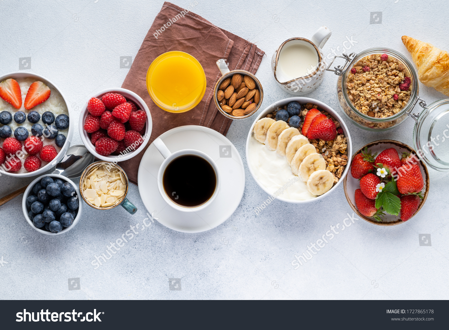 Healthy breakfast set on grey background. The concept of delicious and healthy food. Top view, copy space. #1727865178