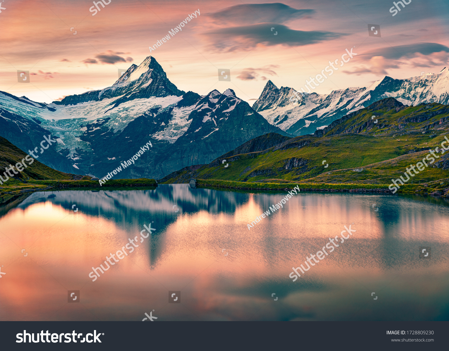 Breathtaking summer sunrise on Bachalpsee lake with Schreckhorn and Wetterhorn peaks on background. Astonishing morning scene in the Swiss Bernese Alps, Switzerland, Europe.  #1728809230