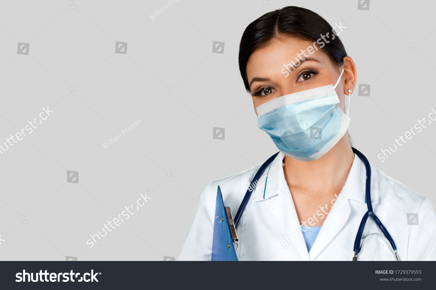Doctor wearing a protective face mask. Coronavirus concept #1729379593