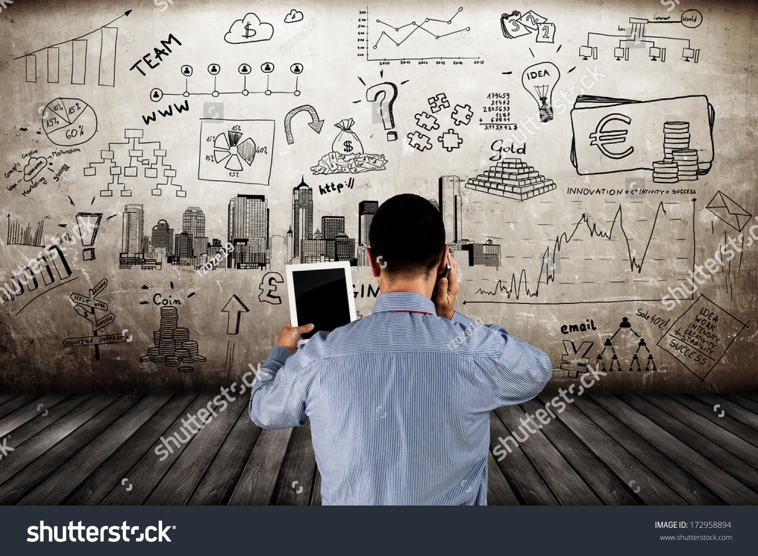 Businessman using tablet and phone on the business concept background #172958894
