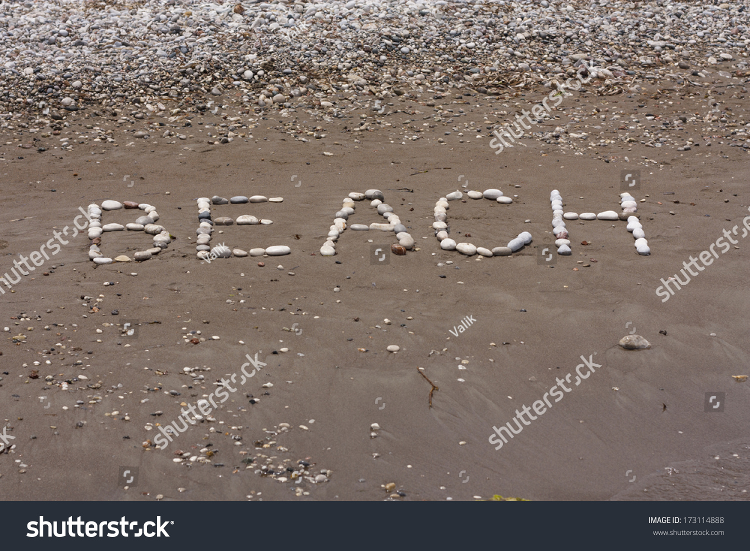 Stones sea background in wet sand of beach in sunny day photo #173114888