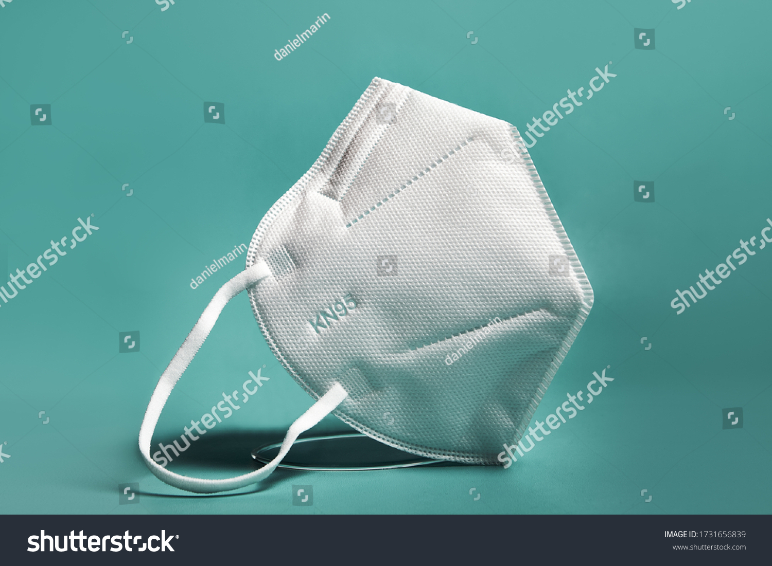 White FFP2, KN95 respirator. Dust protection respirator or medical respiratory mask against the virus. Surgical protective mask. prevention of the spread of coronavirus pandemic COVID-19 SARS-COV-2 #1731656839
