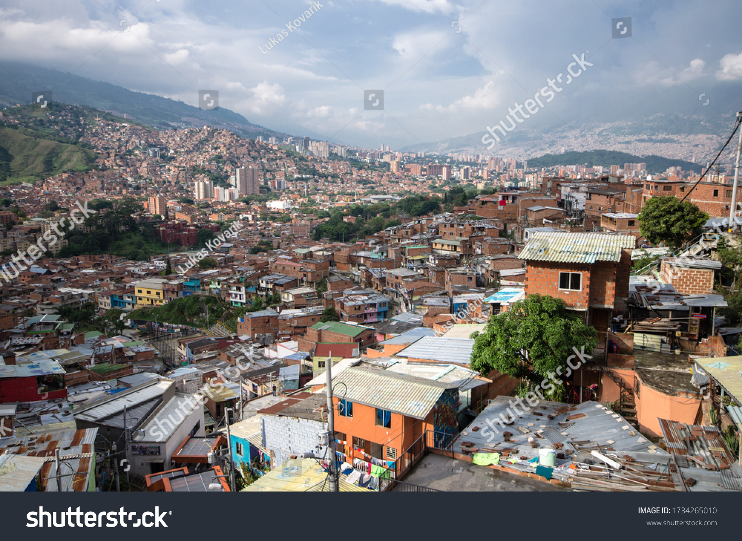 Medellín slums, Colombian slum, Medellin cartel, Beautiful view on the communa 13 Neighborhood, outstanding house, cityscape in colombia #1734265010