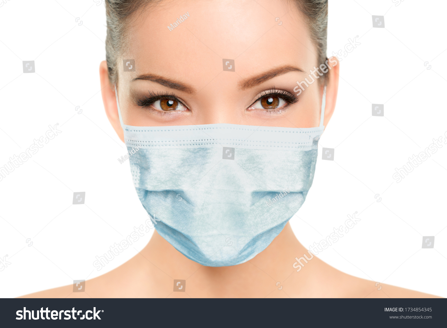 Beautiful Asian woman wearing medical face mask with eyes makeup beauty model portrait isolated on white background for Coronavirus. #1734854345