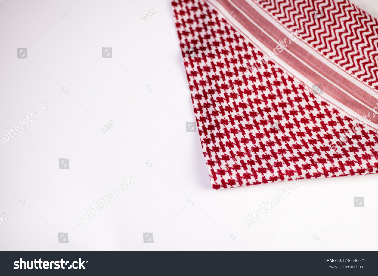 Ghutrah also known as Keffiyeh or Shmag. This item of clothing are usually worn by men as a traditional head-dress in Arab Countries especially in gulf countries such as Saudi Arabia. #1736696021