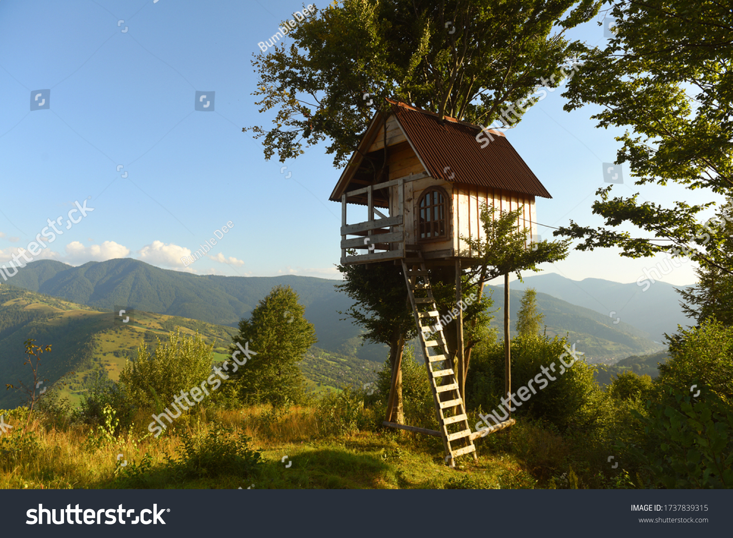 tree house in the mountains, a children's treehouse #1737839315