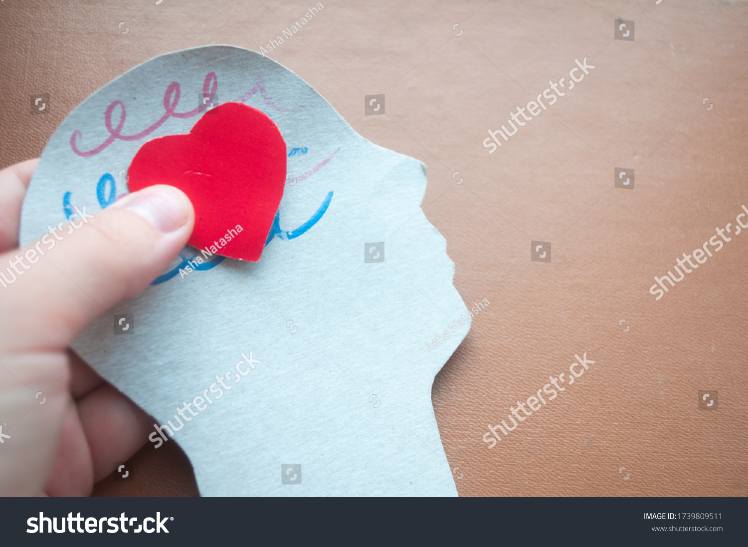 Hand holding brain cut paper brain encephalography, epilepsy awareness, epilepsy, mental health concept. World Brain Tumor Day. World Alzheimer's Day. World Parkinson's Day. #1739809511