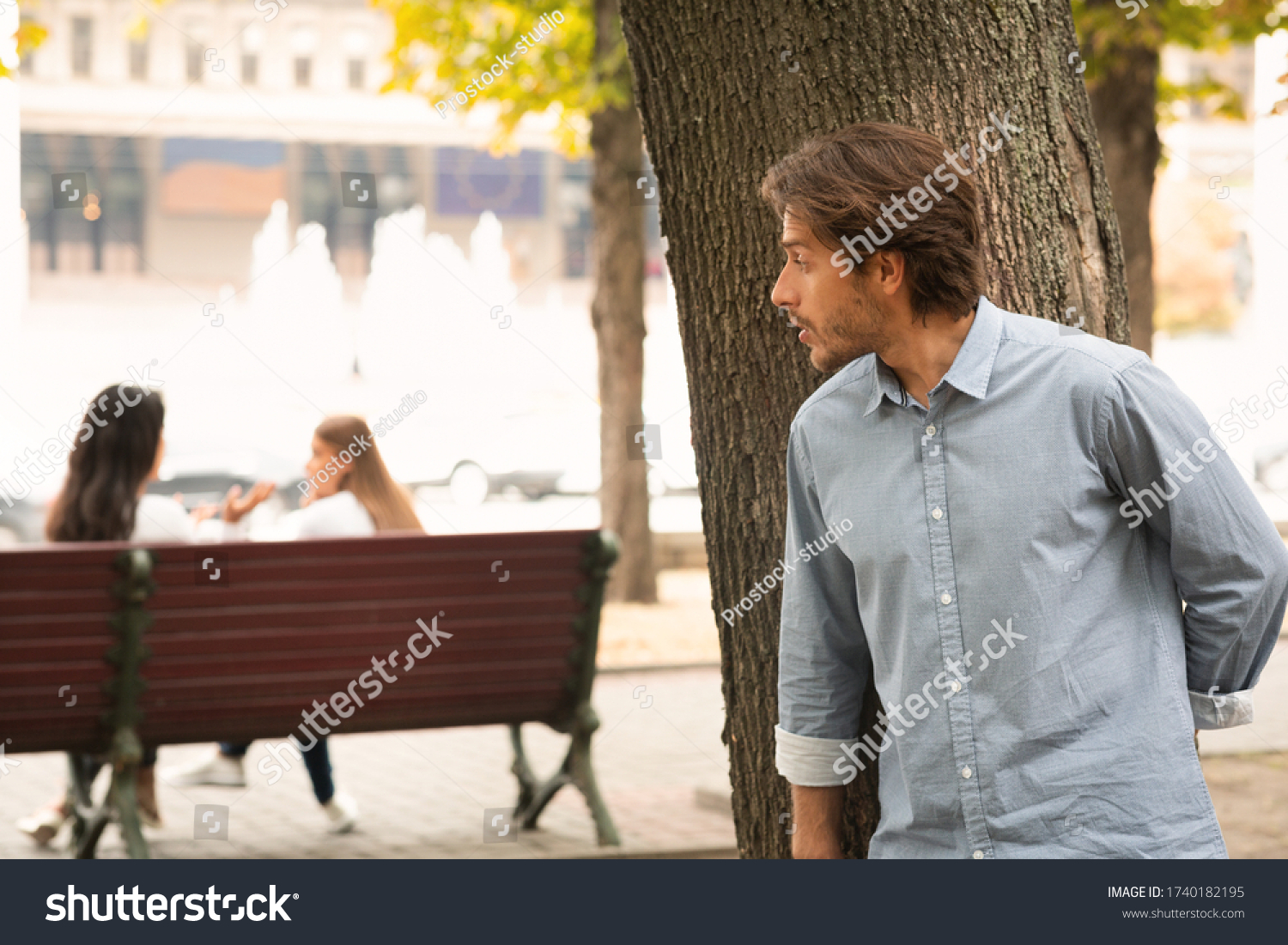 Suspicious Man Spying On Girls Stalking Them While They Talking Sitting In Park #1740182195