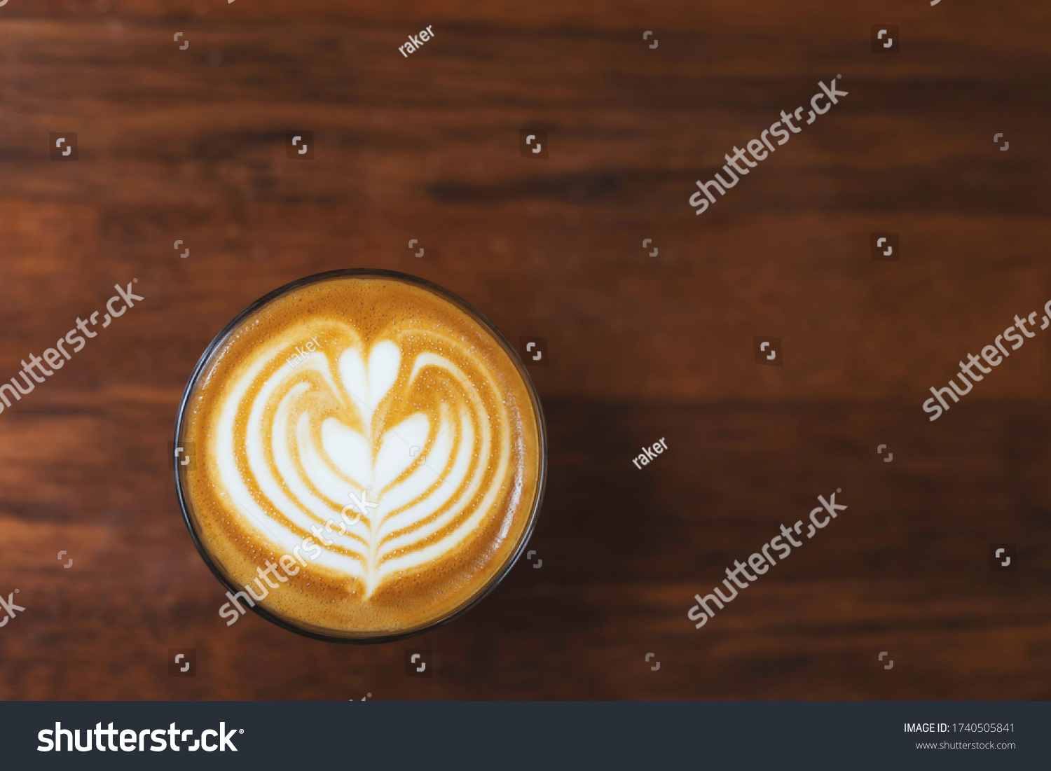 Top-down hot latte coffee cup on wooden tabel with copy space for text. #1740505841