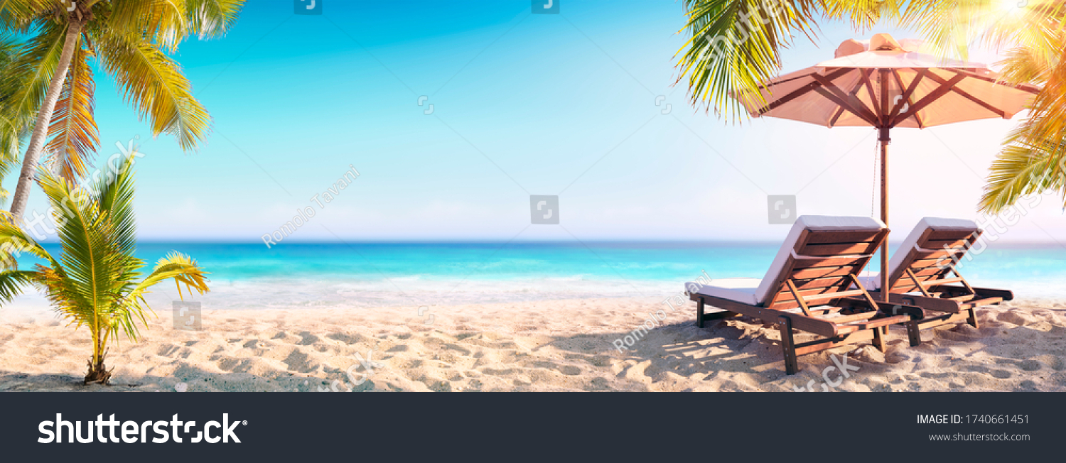 Chairs And Parasol With Palm Trees In The Tropical Beach
 #1740661451