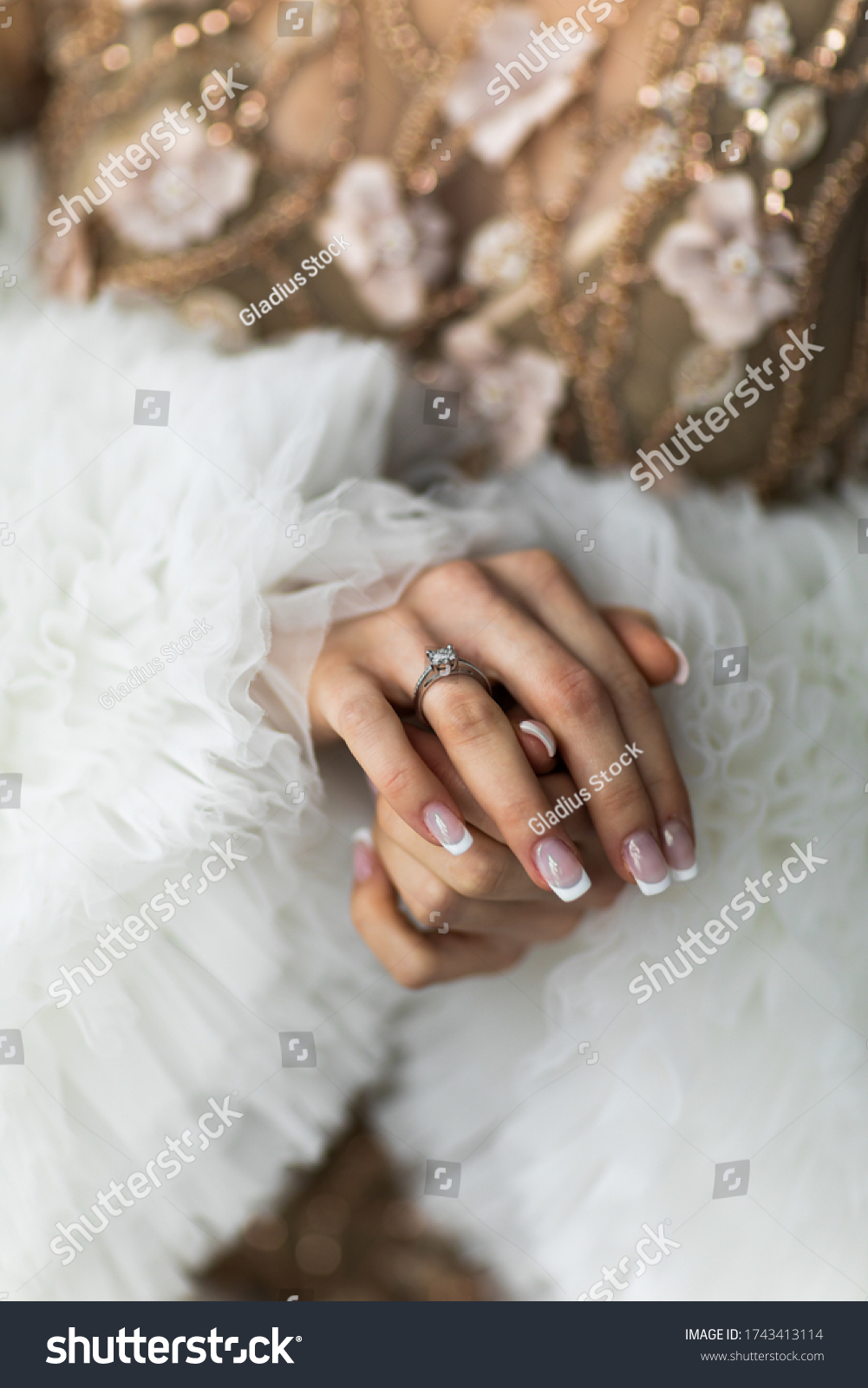 Couple. You can see the hands of woman. Sensually.Focus on the wedding ring #1743413114
