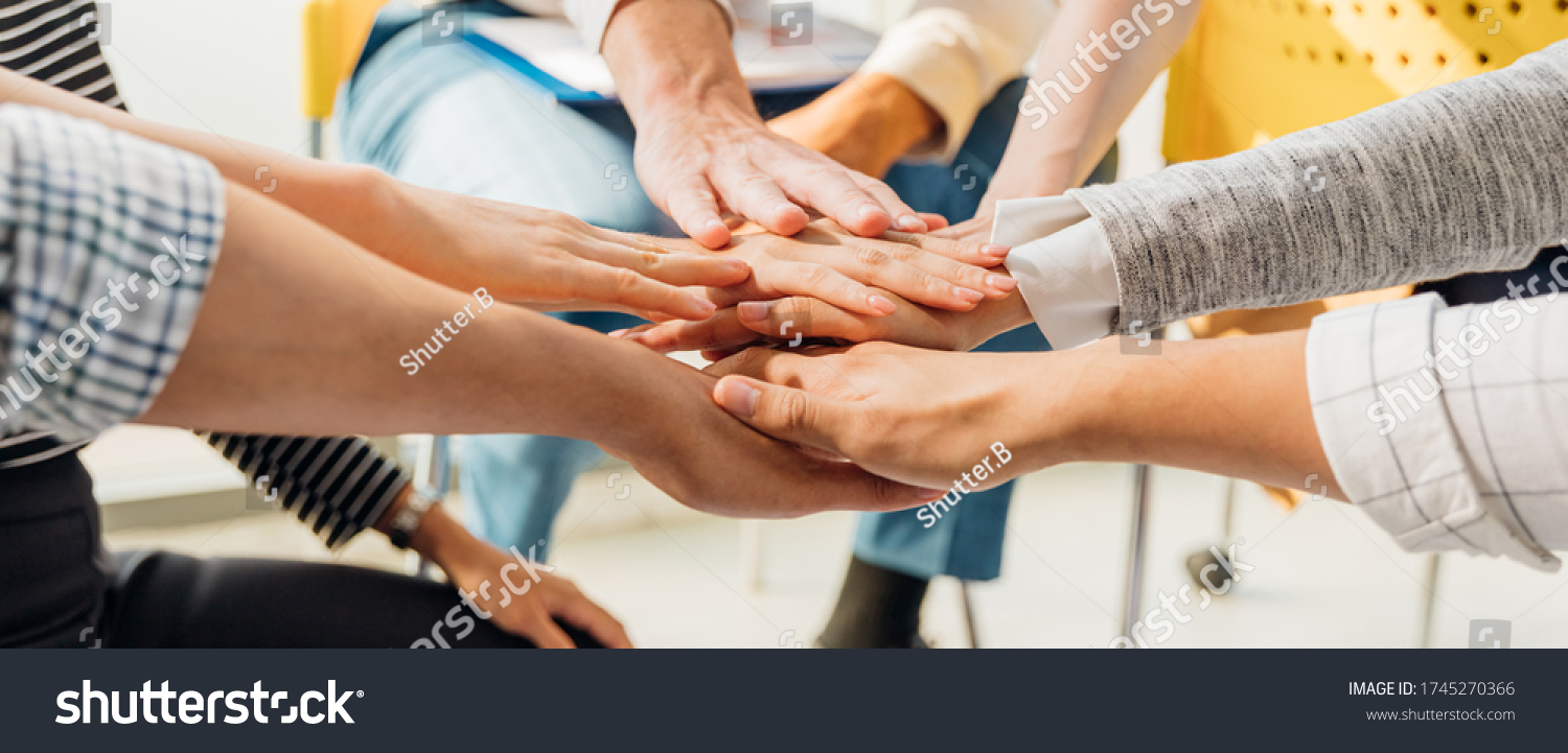 Panoramic teamwork business join hand together concept, Business team standing hands together, Volunteer charity work. People joining for cooperation success business. #1745270366