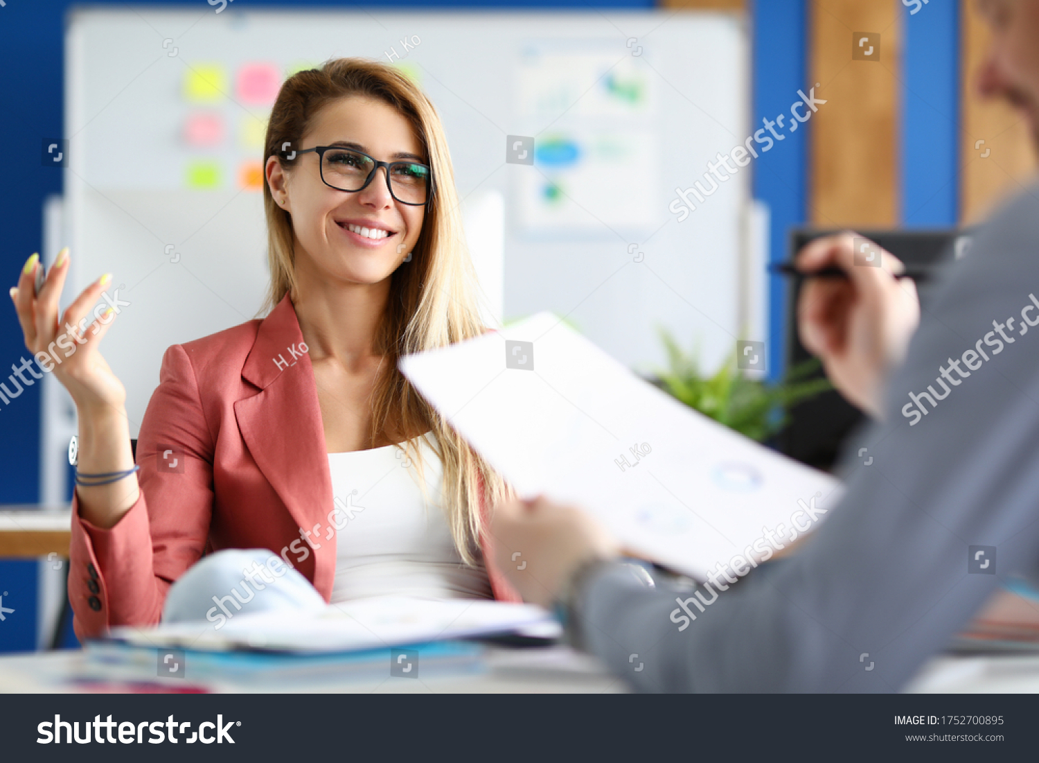 Two adult business people make work interview against office background.One on one meeting concept. #1752700895