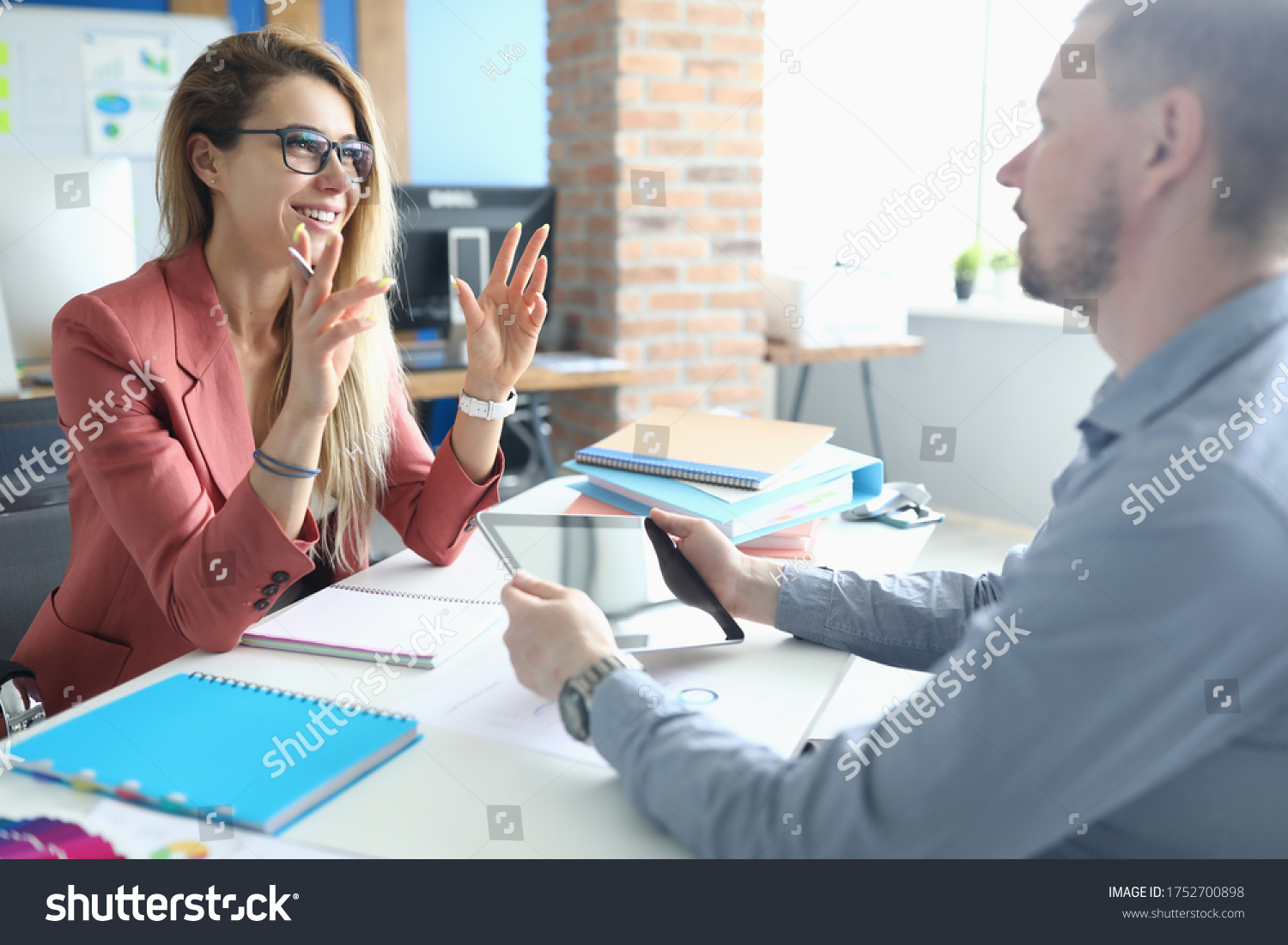 Two adult business people make work interview against office background.One on one meeting concept. #1752700898